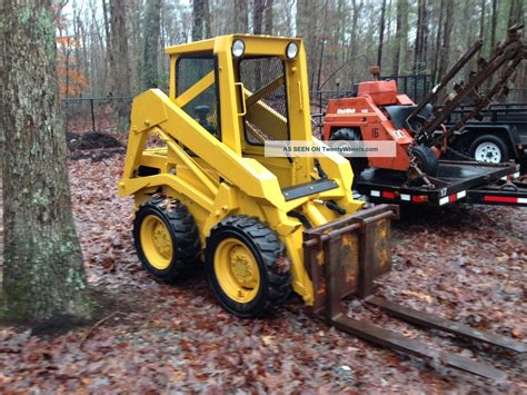 john deere 575 skid steer attachments|john deere 575 skid steer specs.